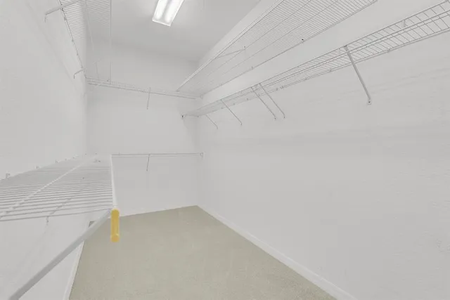 a view of a room with racks on the wall