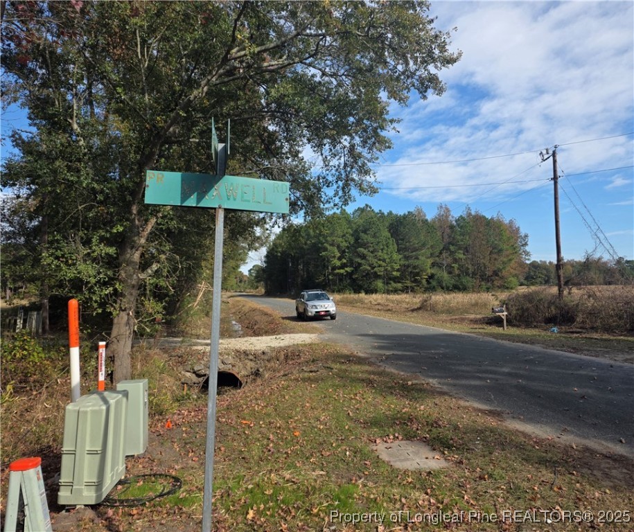 409 Burns Road Lumberton, NC 28358 - Photo 3 of 16 a view of a street with a large trees