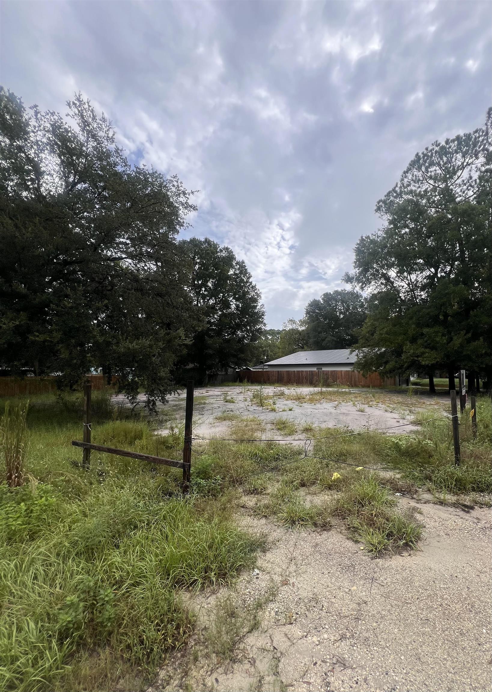 1046 Collier Boulevard St. Augustine, FL 32084 - Photo 2 of 3 a view of a yard with a fountain