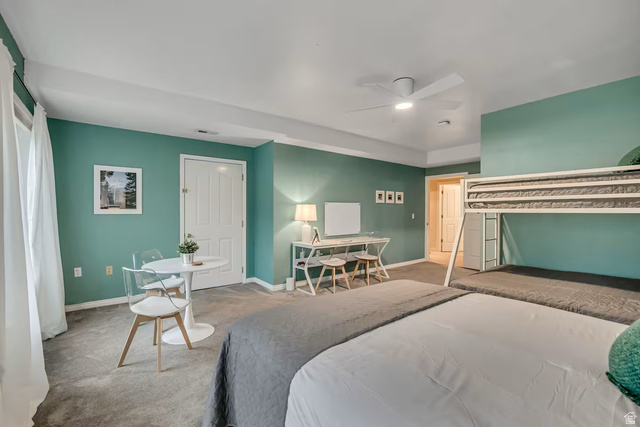 11789 Nicklaus Road Sandy, UT 84092 - Photo 32 of 58 Carpeted bedroom featuring baseboards and a ceiling fan
