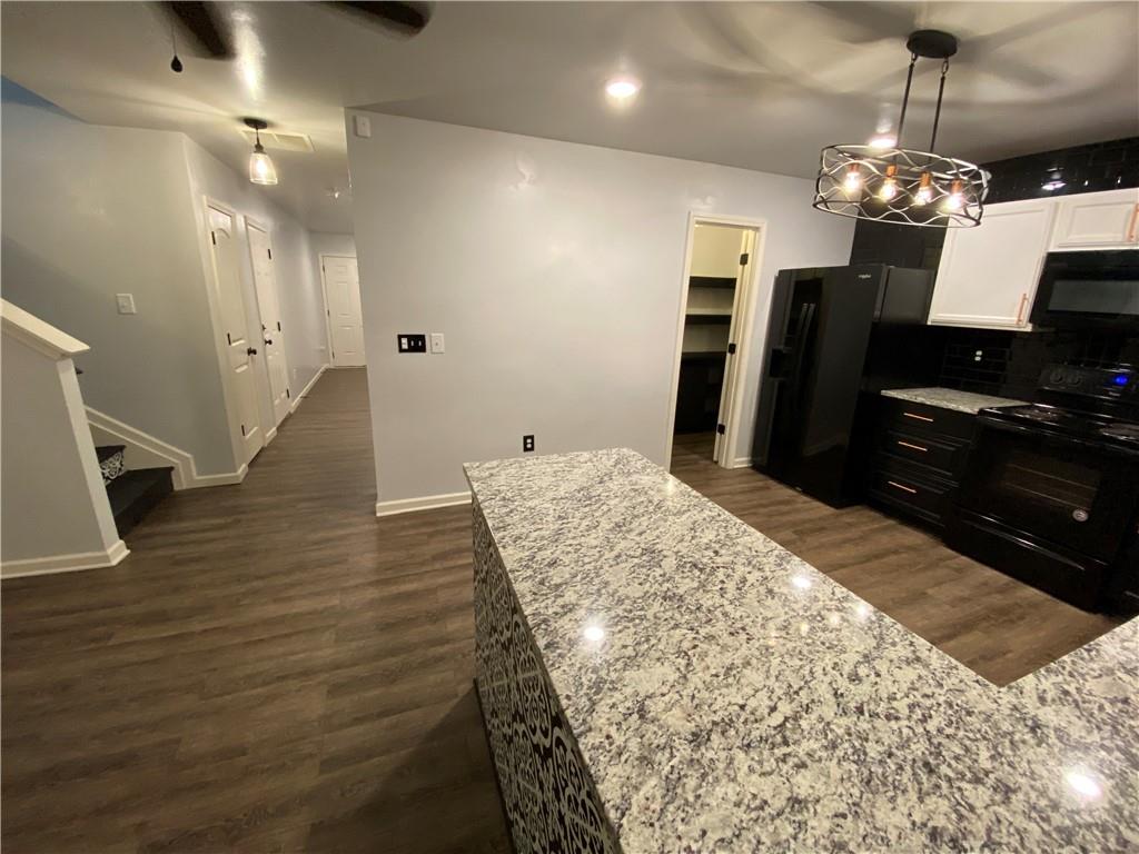 764 Dove Tree Lane Social Circle, GA 30025 - Photo 16 of 48 a spacious bathroom with a sink a large mirror and a shower