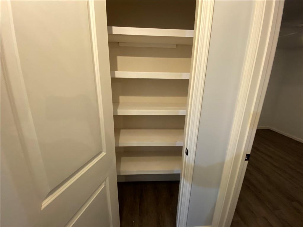 764 Dove Tree Lane Social Circle, GA 30025 - Photo 25 of 48 a view of walk in closet with empty racks