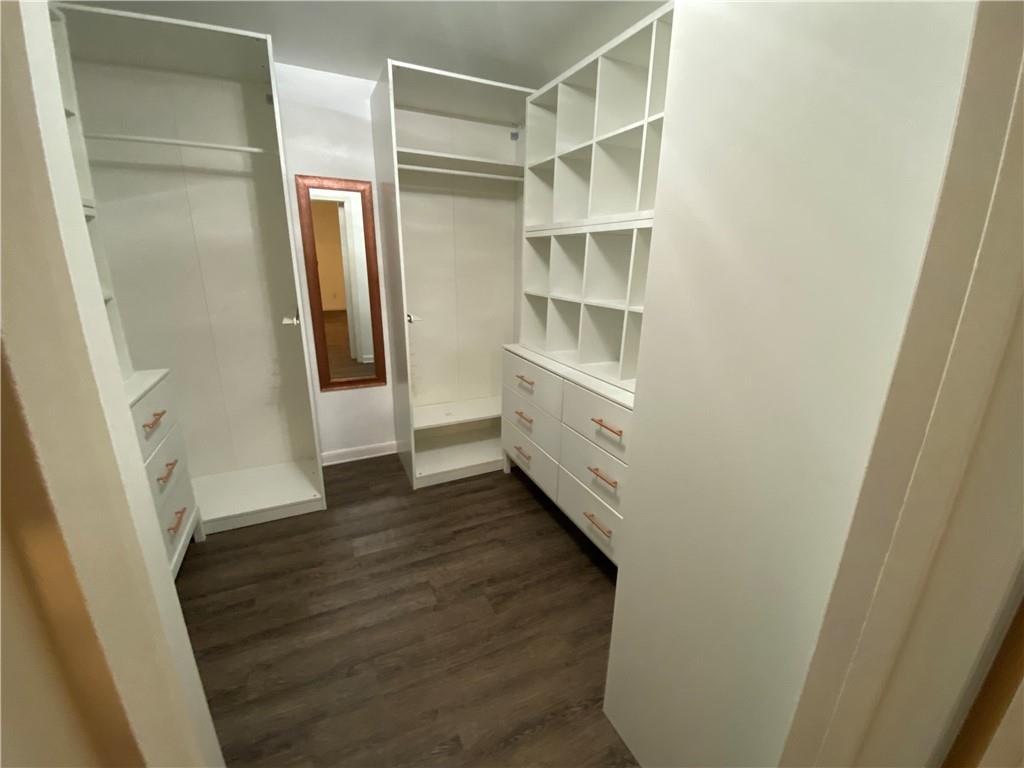 764 Dove Tree Lane Social Circle, GA 30025 - Photo 35 of 48 a view of walk in closet with empty racks