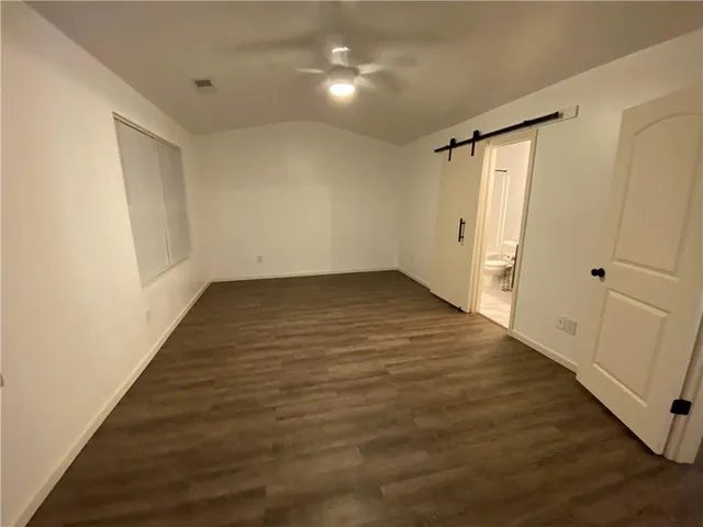 a view of swimming pool with seating space