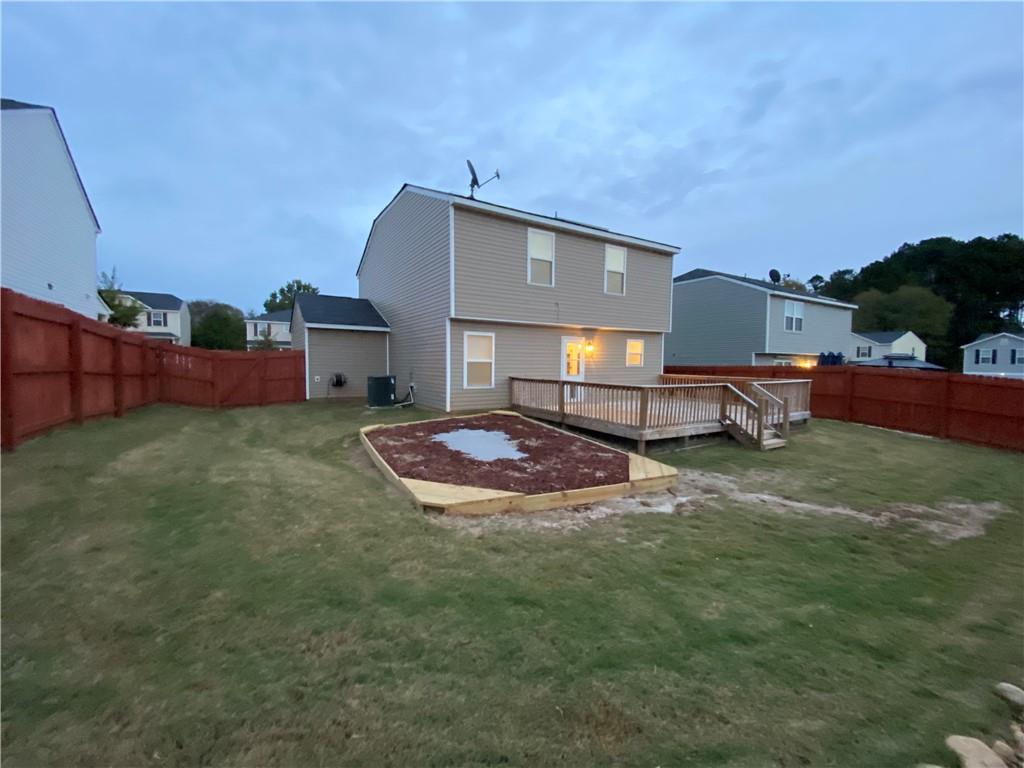 764 Dove Tree Lane Social Circle, GA 30025 - Photo 44 of 48 a view of a house with a yard