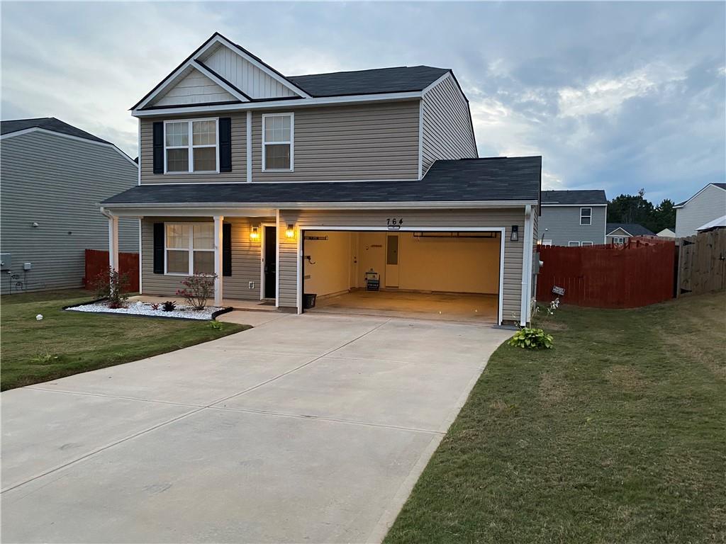 764 Dove Tree Lane Social Circle, GA 30025 - Photo 47 of 48 a front view of a house with a yard