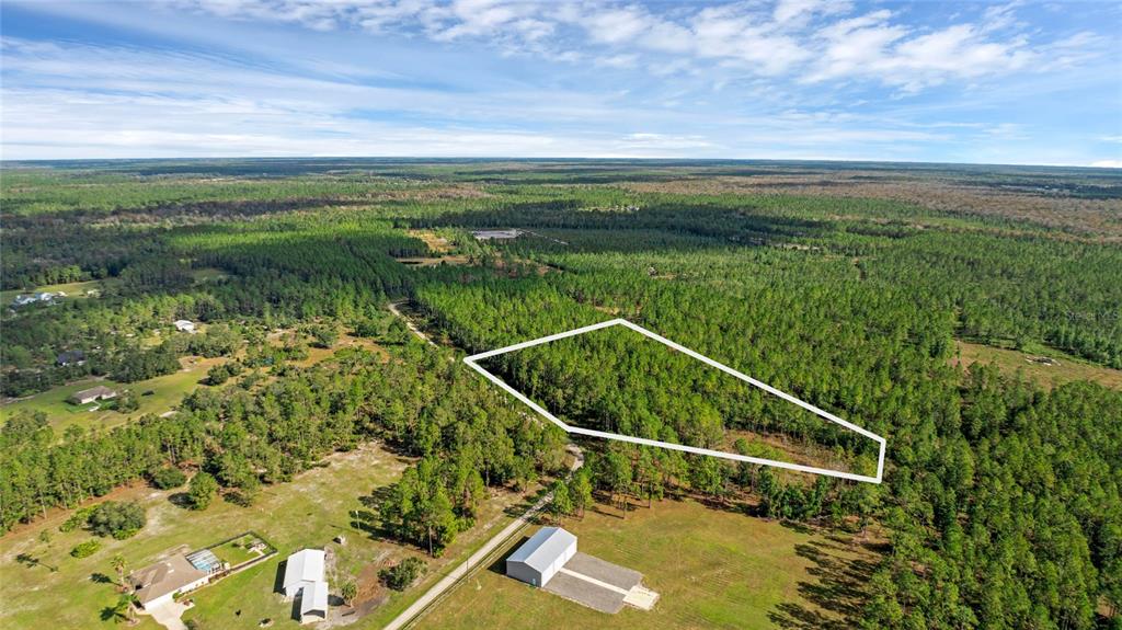 1 Wild Cur Road Pierson, FL 32180 - Photo 1 of 9 a view of a tennis court