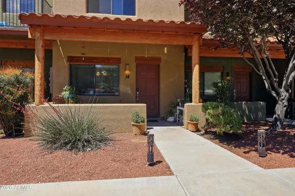 a view of house with outdoor seating space