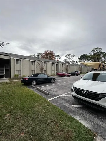 a view of street with parked cars