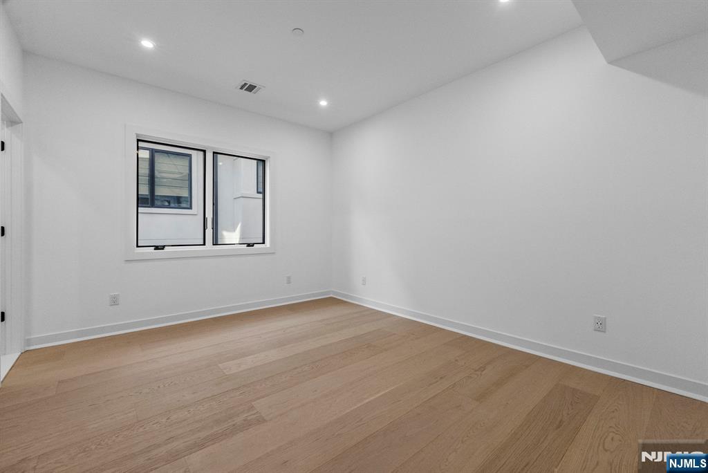 2189 Jones Road Fort Lee, NJ 07024 - Photo 23 of 33 an empty room with a window