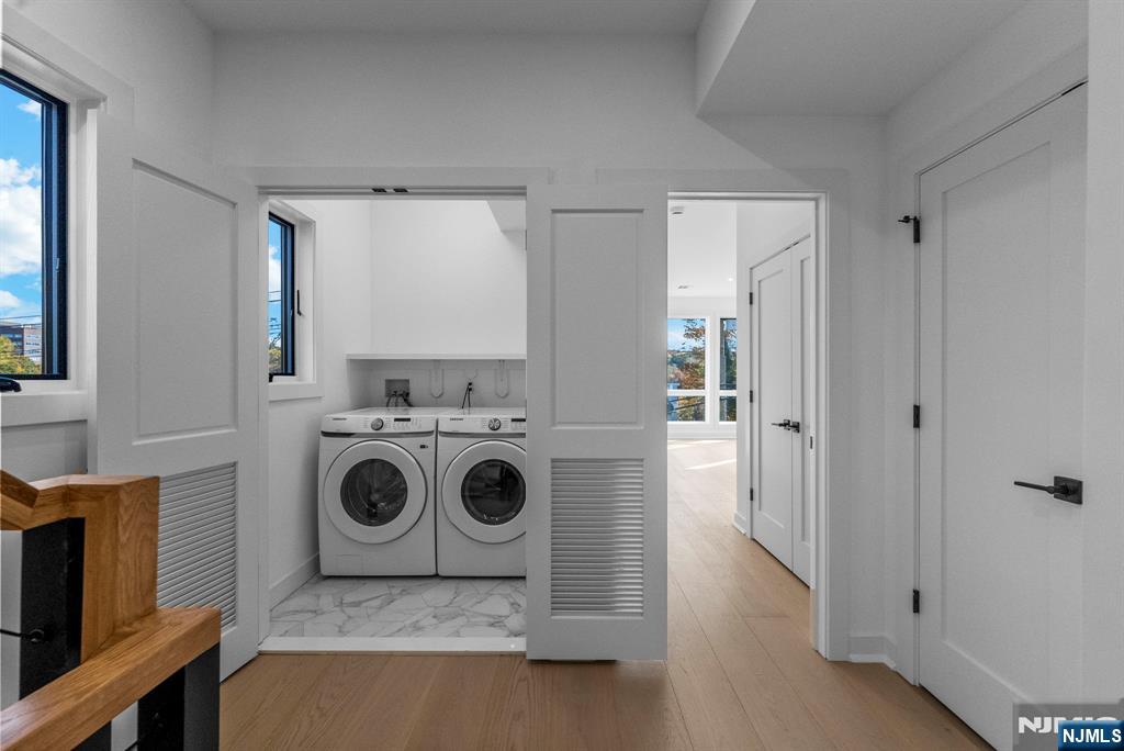 2189 Jones Road Fort Lee, NJ 07024 - Photo 26 of 33 a utility room with dryer and washer