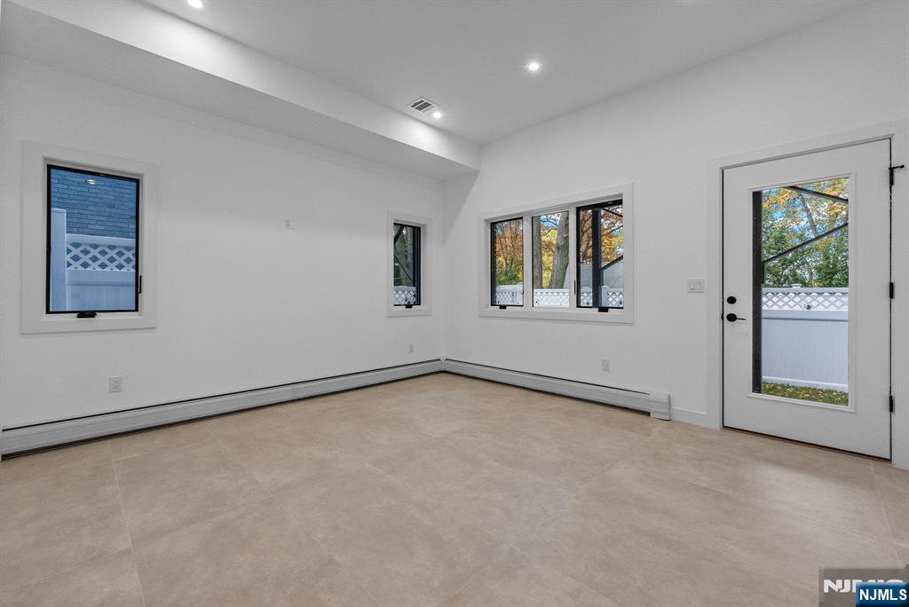 2189 Jones Road Fort Lee, NJ 07024 - Photo 33 of 33 an empty room with windows and closet