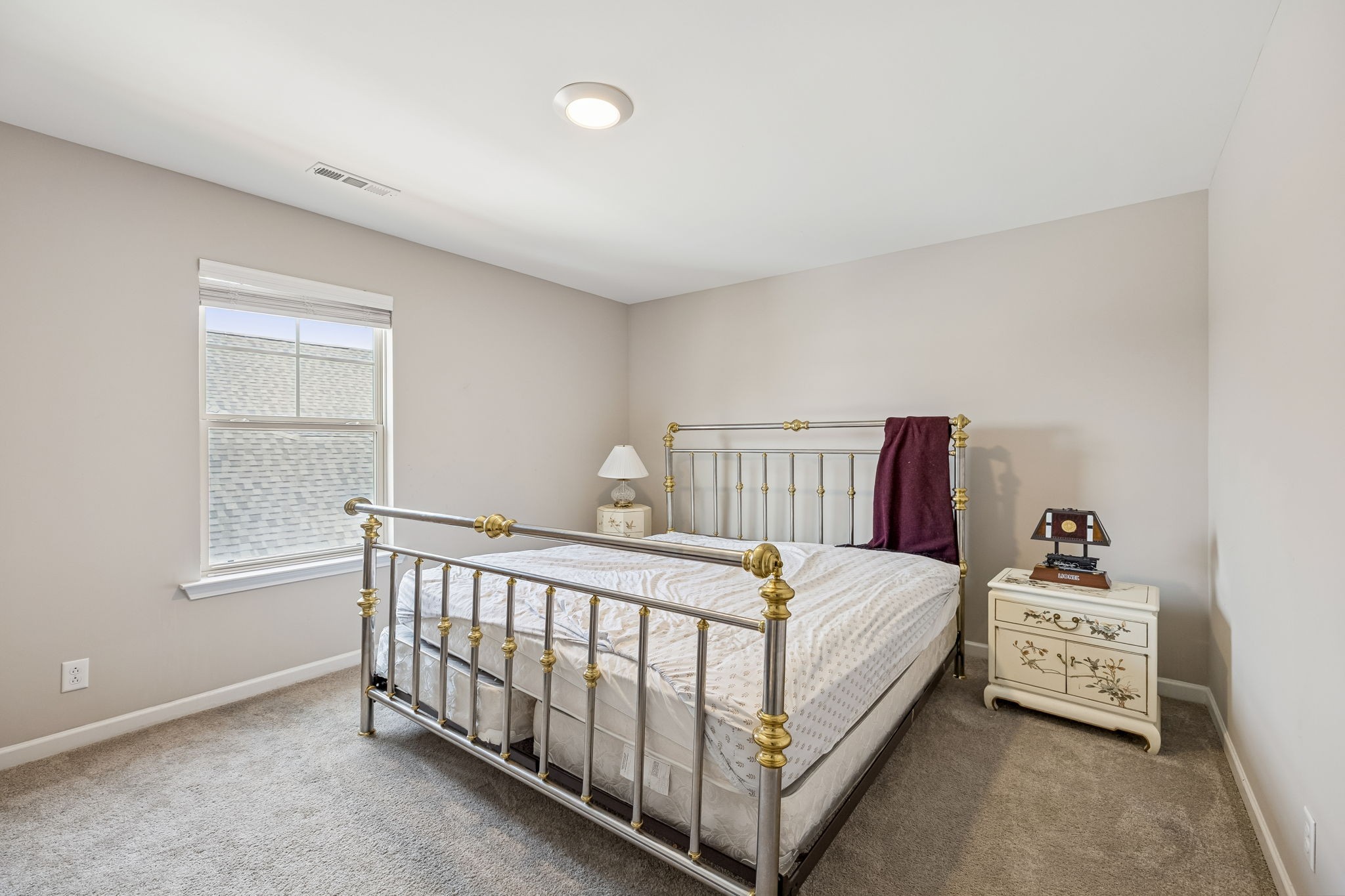 501 Ruby Cate Way Murfreesboro, TN 37128 - Photo 15 of 27 a bedroom with a bed and a window