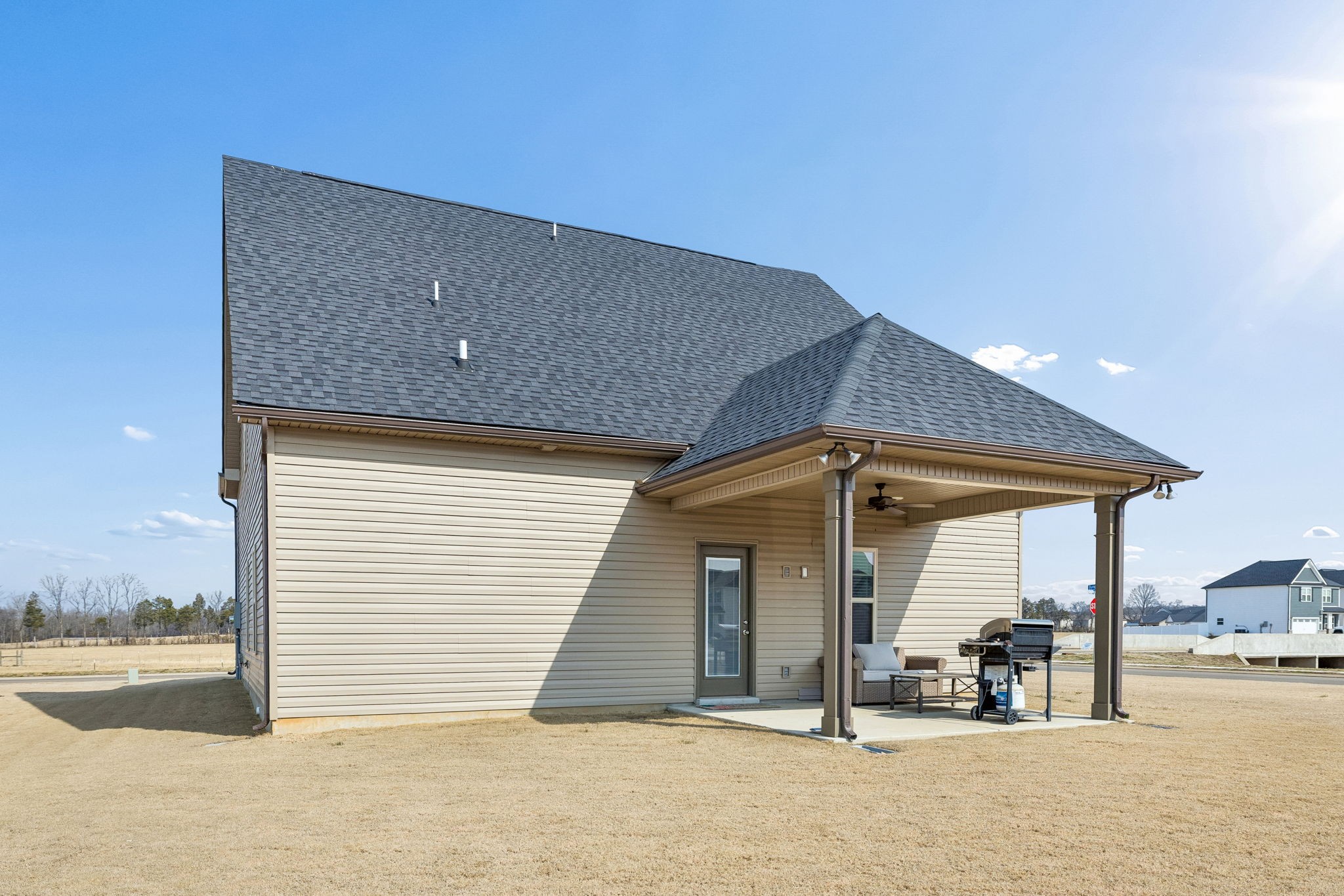 501 Ruby Cate Way Murfreesboro, TN 37128 - Photo 22 of 27 a backyard of a house with table and chairs