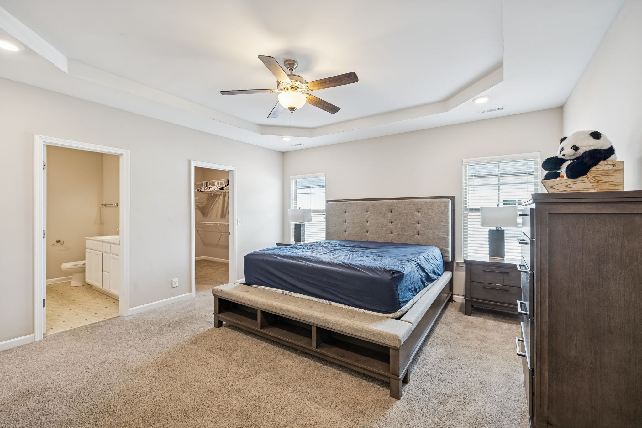 501 Ruby Cate Way Murfreesboro, TN 37128 - Photo 9 of 27 a bedroom with a bed and a chandelier