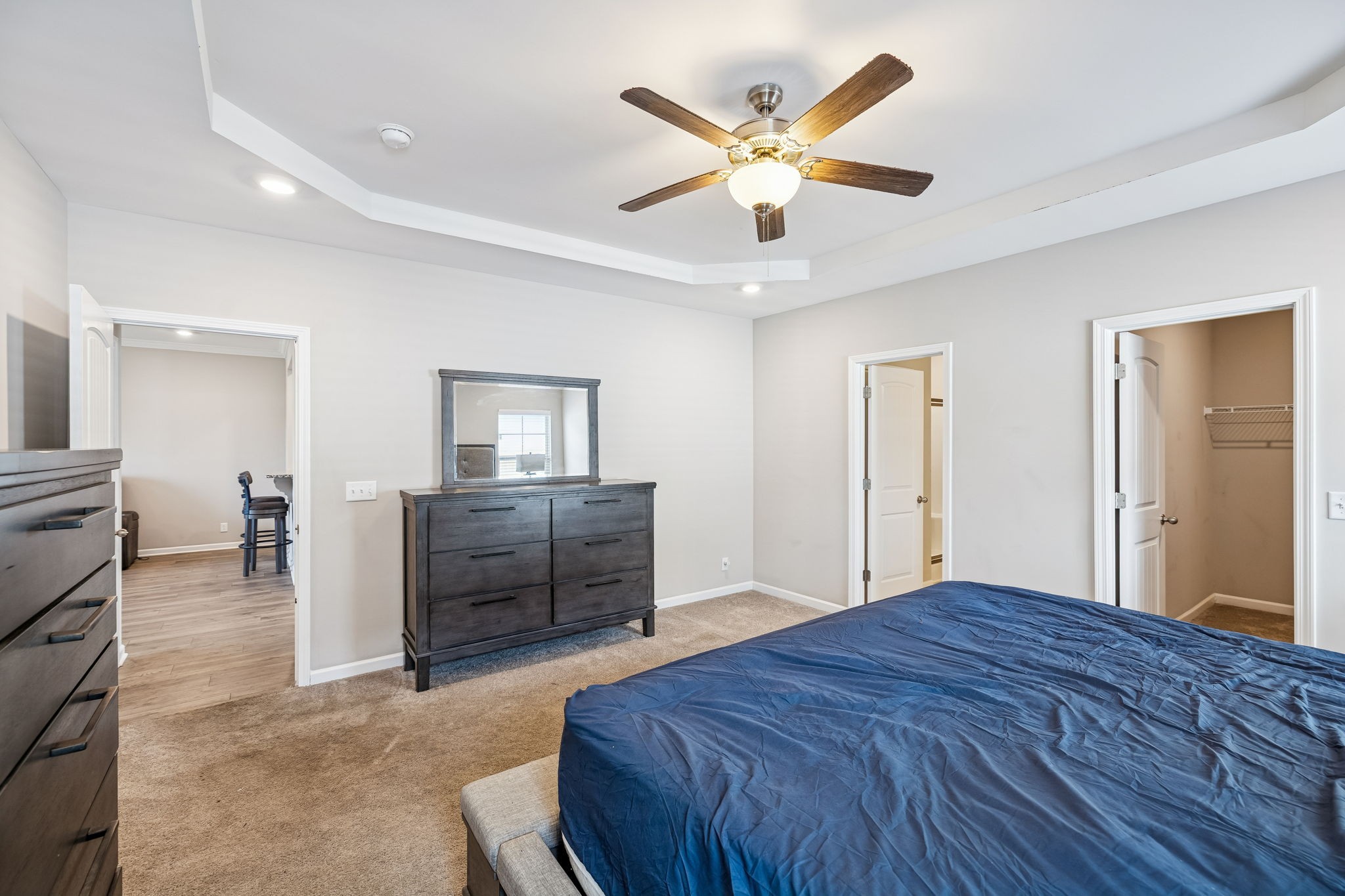 501 Ruby Cate Way Murfreesboro, TN 37128 - Photo 10 of 27 a bedroom with a bed and a chandelier