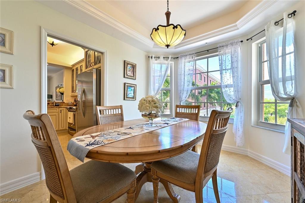 401 Bayfront Place, Unit 3301 Naples, FL 34102 - Photo 11 of 24 a view of a dining room with furniture window and outside view