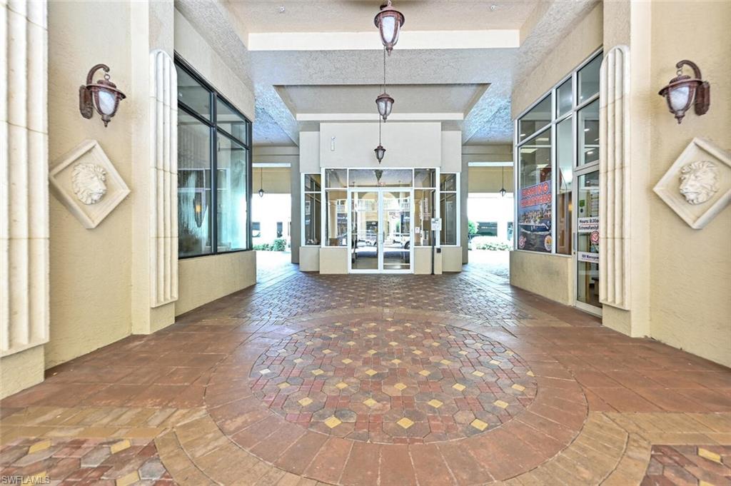 401 Bayfront Place, Unit 3301 Naples, FL 34102 - Photo 23 of 24 a view of a hallway with seating area