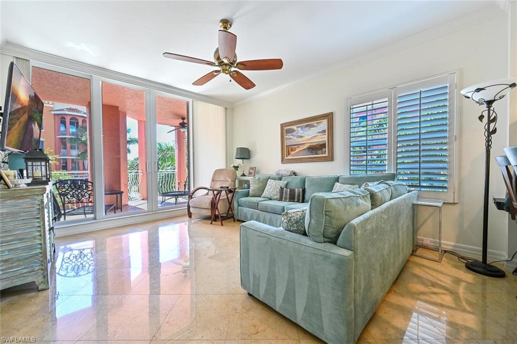 401 Bayfront Place, Unit 3301 Naples, FL 34102 - Photo 5 of 24 a living room with furniture and a large window