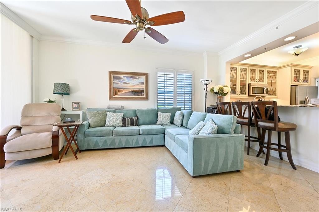 401 Bayfront Place, Unit 3301 Naples, FL 34102 - Photo 6 of 24 a living room with furniture and a large window