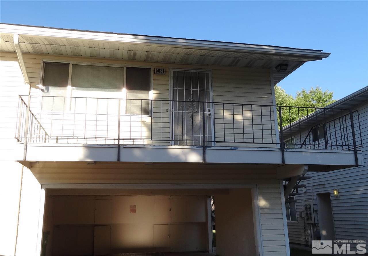 5031 Catalina Drive, Unit 4 Reno, NV 89502 - Photo 1 of 1 a view of a house with a wooden deck