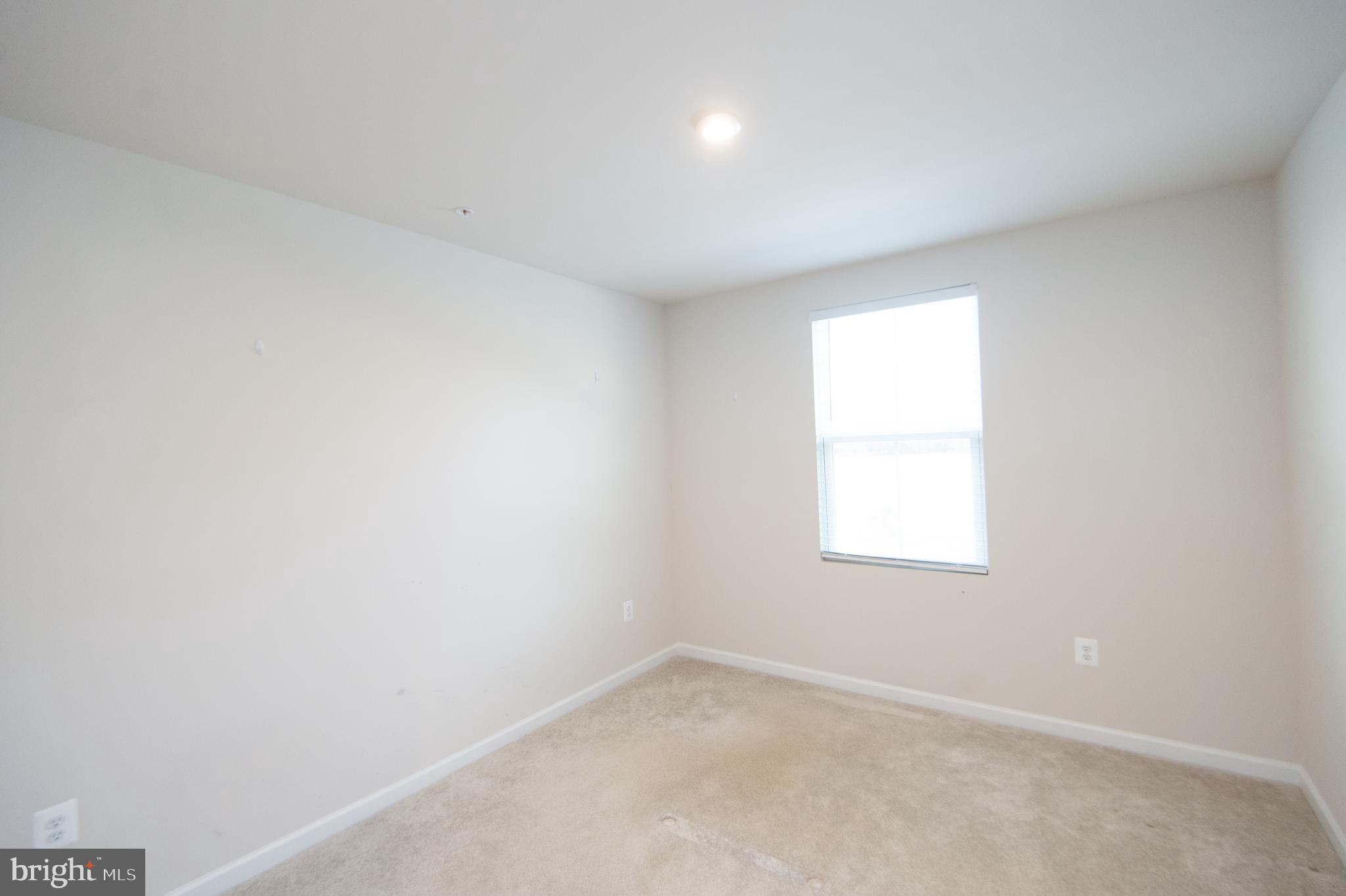 120 Mariners Way Cambridge, MD 21613 - Photo 14 of 44 an empty room with a window