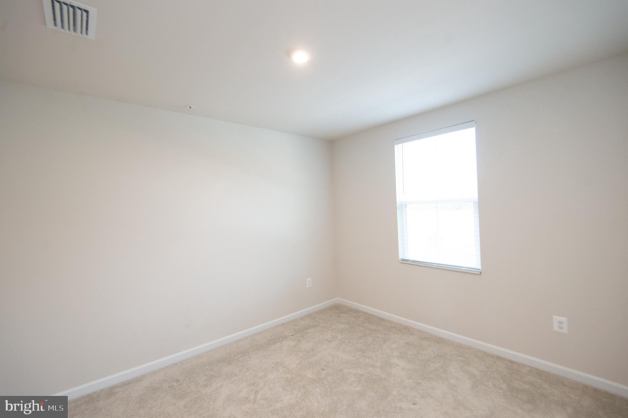 120 Mariners Way Cambridge, MD 21613 - Photo 20 of 44 an empty room with a window