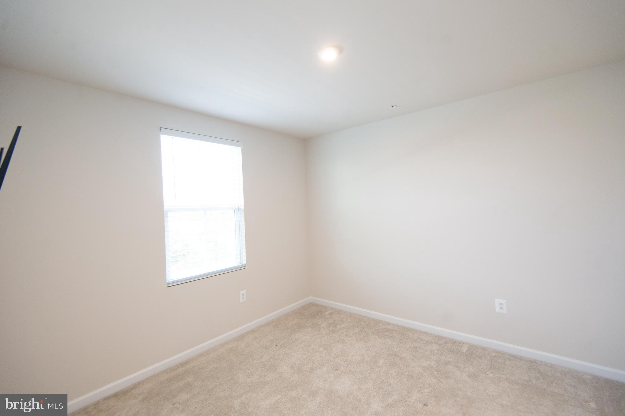 120 Mariners Way Cambridge, MD 21613 - Photo 22 of 44 an empty room with a window