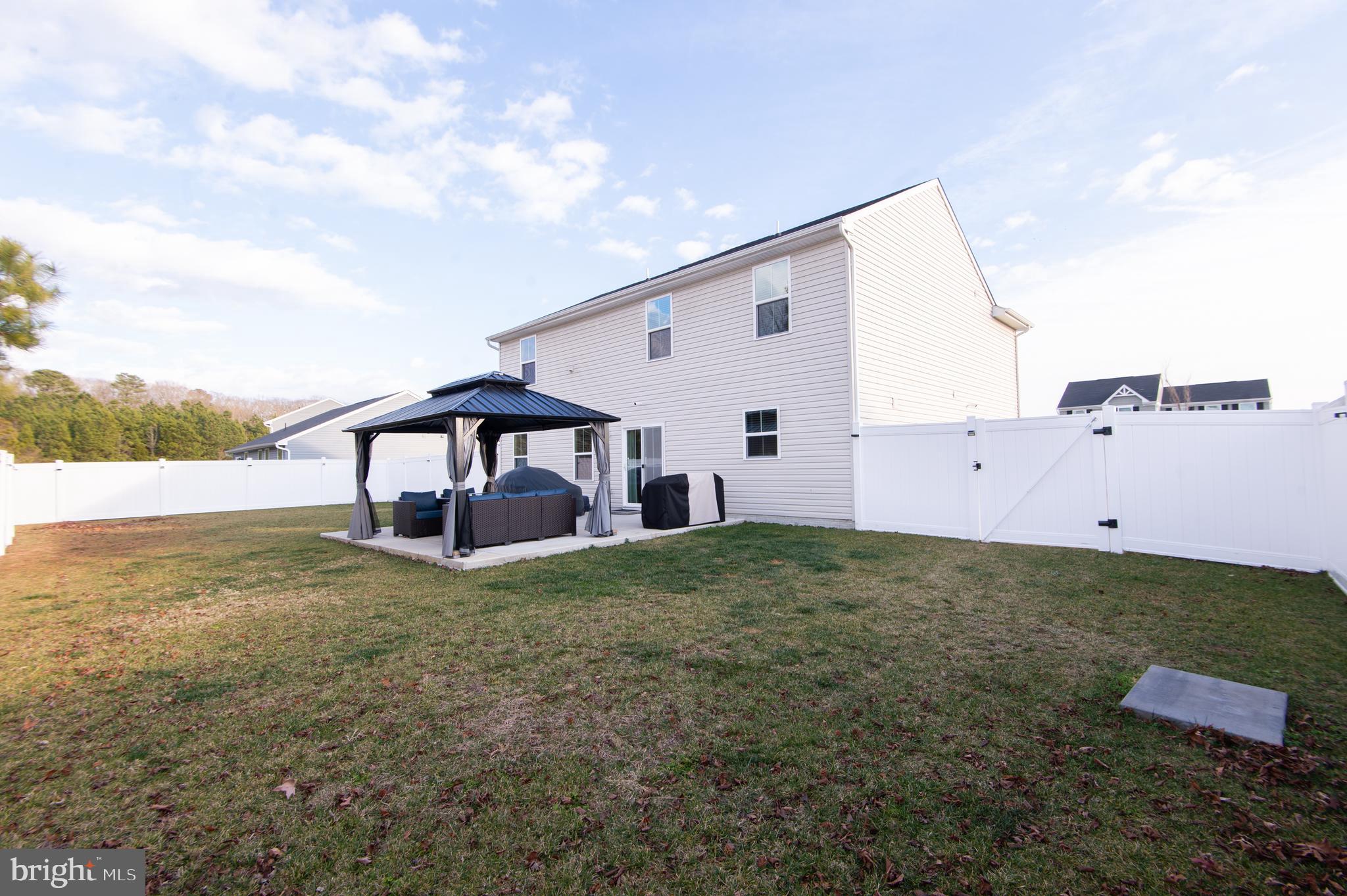 120 Mariners Way Cambridge, MD 21613 - Photo 27 of 44 a view of a house with a yard