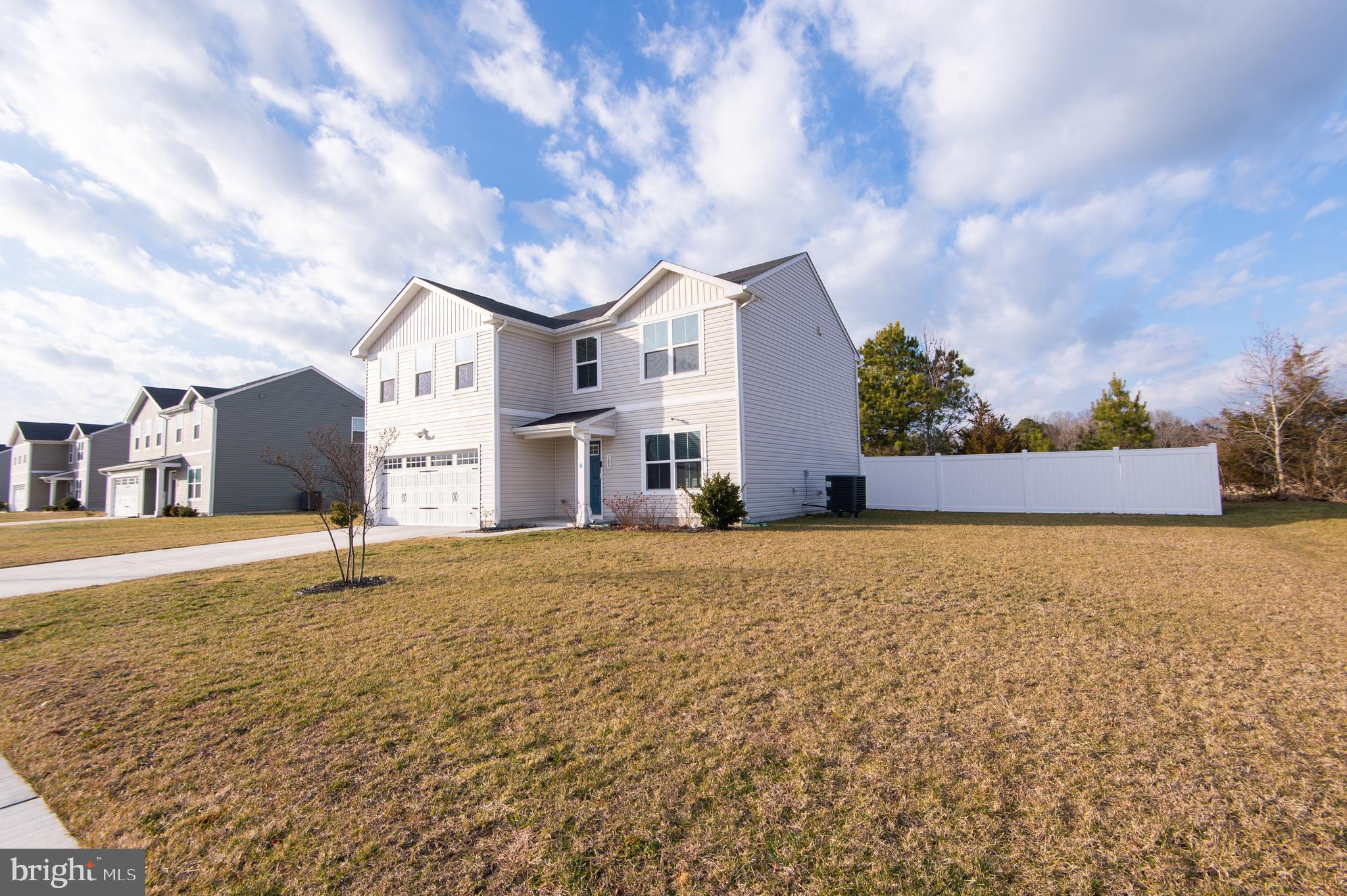 120 Mariners Way Cambridge, MD 21613 - Photo 31 of 44 a front view of a house with a garden