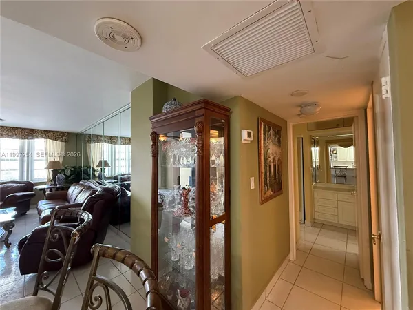 a view of a livingroom with furniture and windows