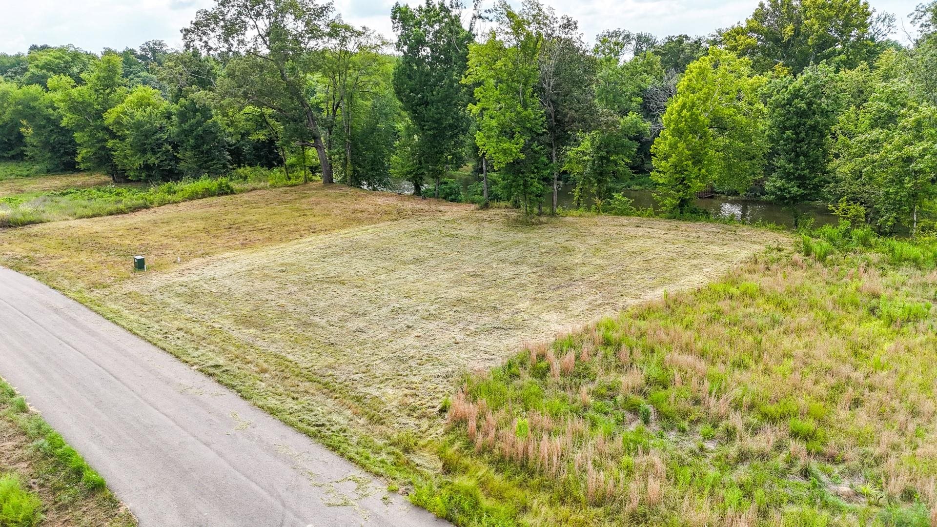 124 Launch Ramp Cove Savannah, TN 38372 - Photo 11 of 33 a view of a backyard of the house