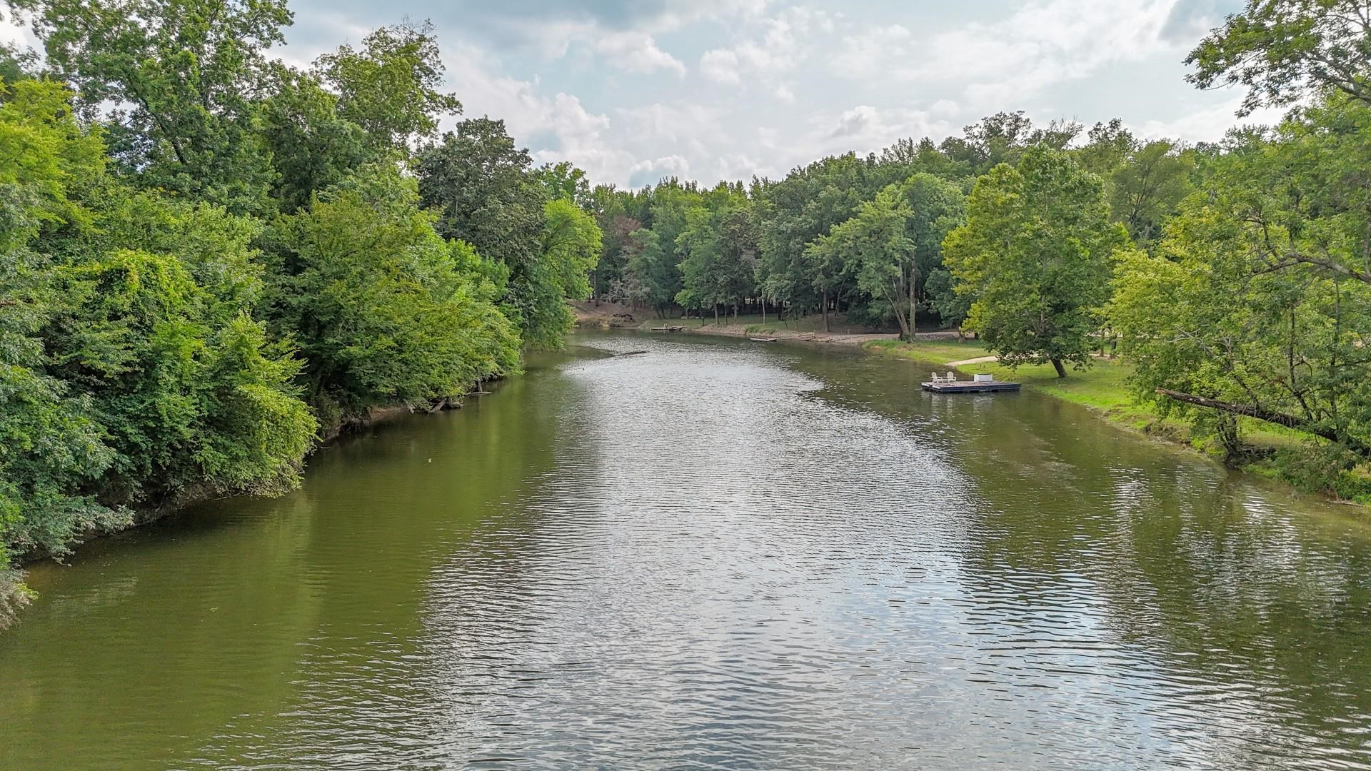 124 Launch Ramp Cove Savannah, TN 38372 - Photo 28 of 33 a view of a lake view with houses in back