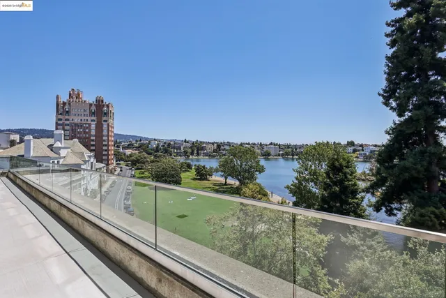 a view of a balcony with city view