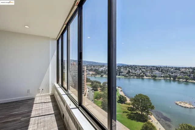 a view of a balcony with lake view and a ocean view