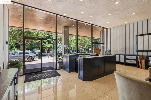 a living room with large windows