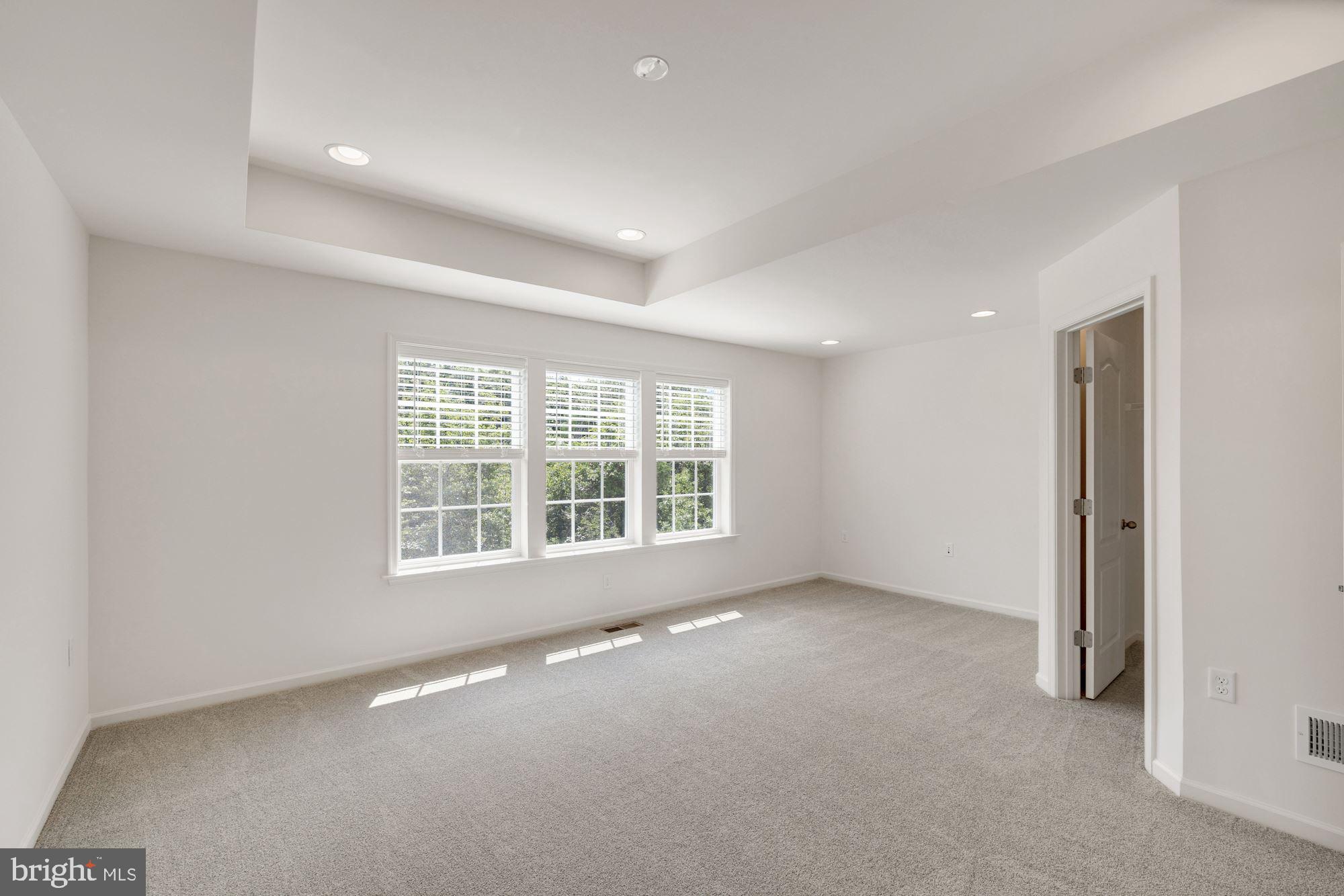 116 Copeley Circle Winchester, VA 22602 - Photo 11 of 23 a view of an empty room with a window