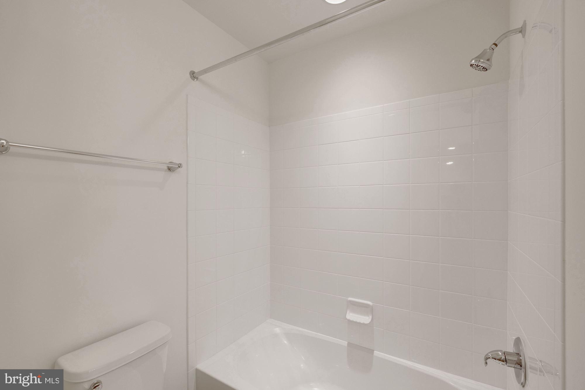 116 Copeley Circle Winchester, VA 22602 - Photo 21 of 23 a bathroom with a bathtub and shower