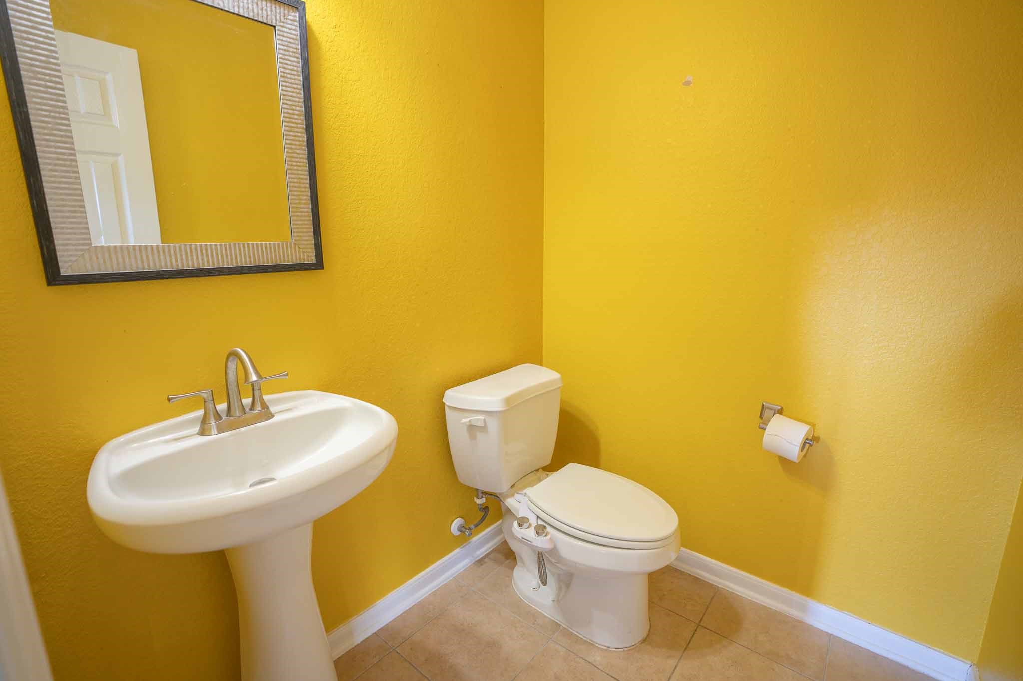 6403 Lost Timber Lane Houston, TX 77066 - Photo 17 of 34 a bathroom with a sink and a toilet