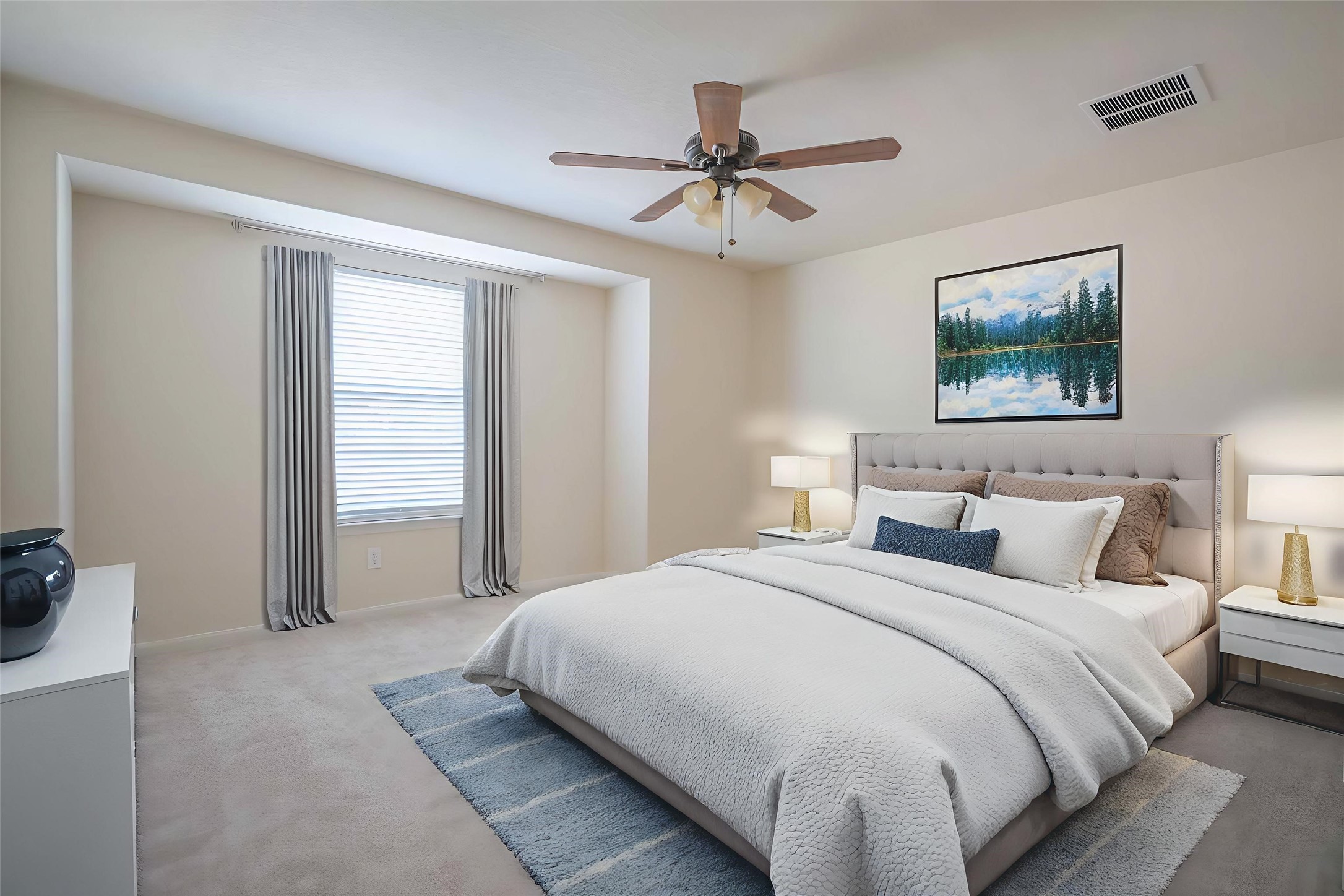 6403 Lost Timber Lane Houston, TX 77066 - Photo 25 of 34 a bedroom with a large bed and a chandelier