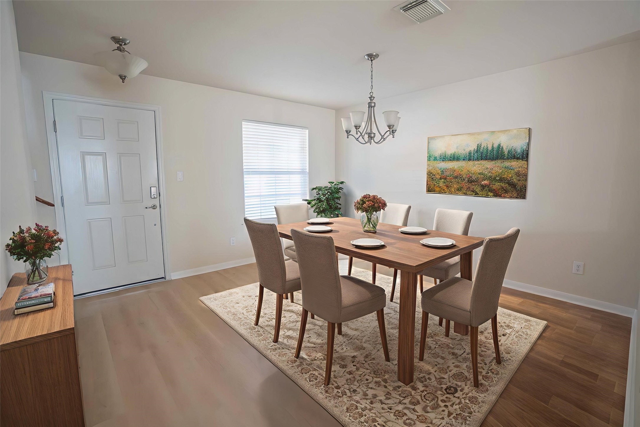 6403 Lost Timber Lane Houston, TX 77066 - Photo 5 of 34 a view of a dining room with furniture and wooden floor