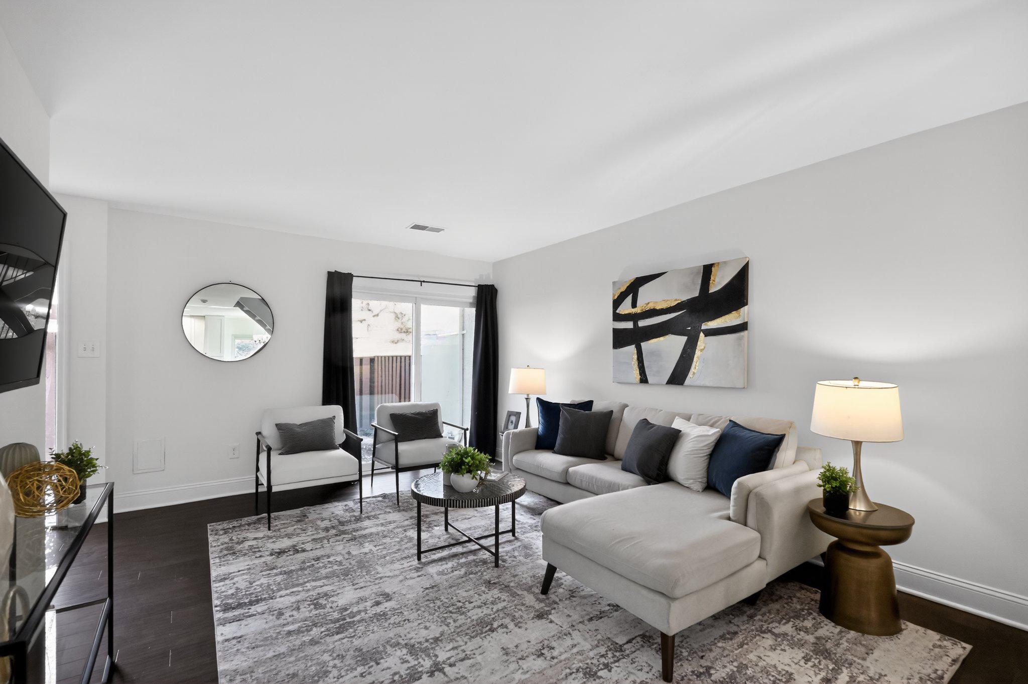 2434 Southgate Square Reston, VA 20191 - Photo 6 of 24 Modern elegance in a bright space. Main lvl Living