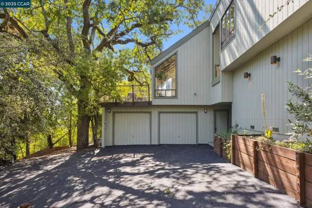 a view of a backyard of the house