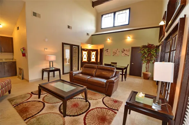 a aerial view of a house with a yard