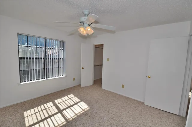 a kitchen with a refrigerator sink and stove