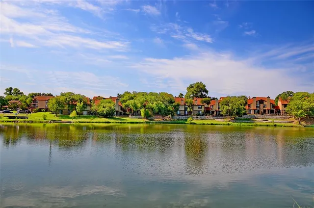 a view of a lake with houses
