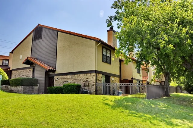 a view of a house with swimming pool