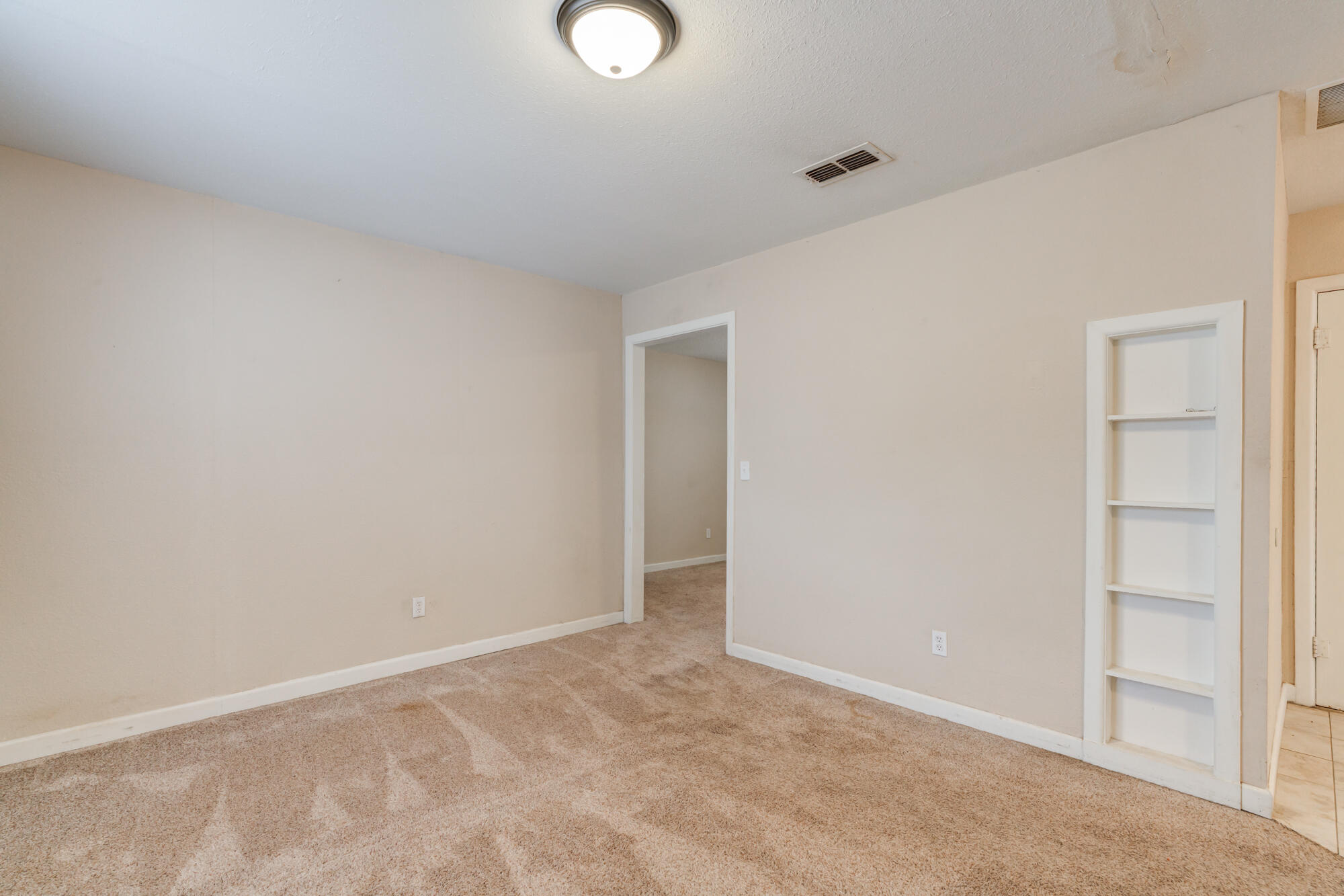 403 East 19th Street Littlefield, TX 79339 - Photo 16 of 34 a view of an empty room