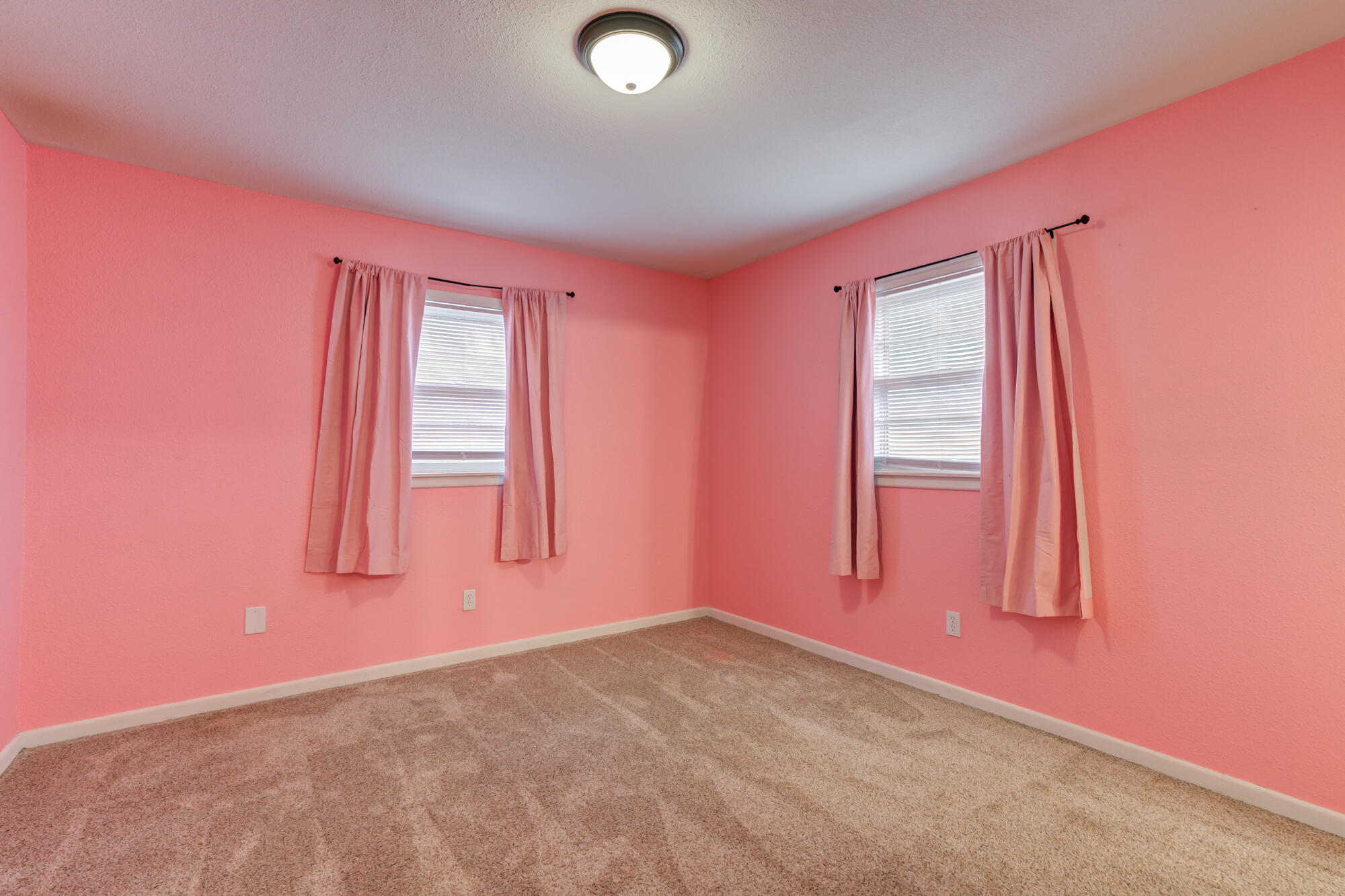 403 East 19th Street Littlefield, TX 79339 - Photo 24 of 34 an empty room with windows