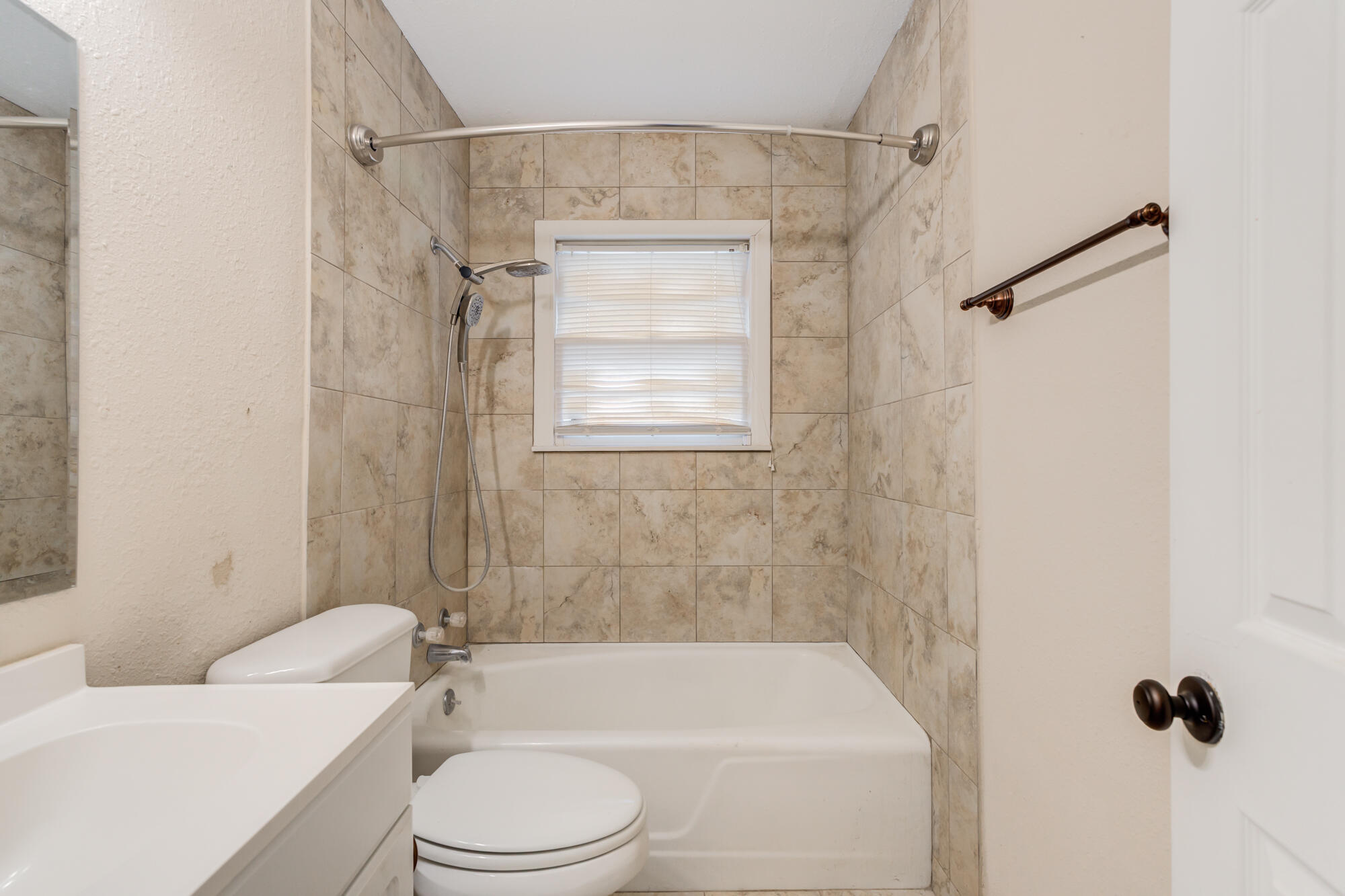 403 East 19th Street Littlefield, TX 79339 - Photo 31 of 34 a bathroom with a toilet and a shower